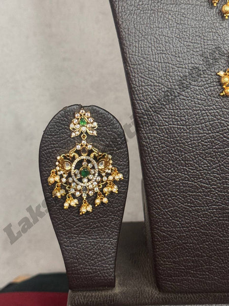 Temple with Diamond look Stone