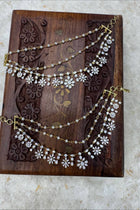 AD Stone Flower Design Ear Chain Mattal