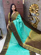 Vaira Oosi Golden Zari With Coffee Brown Border